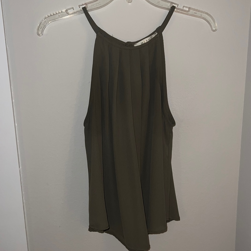 Dark green top.